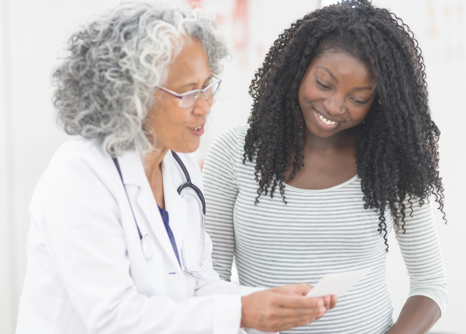 cesarean birth- black woman talks with doctor