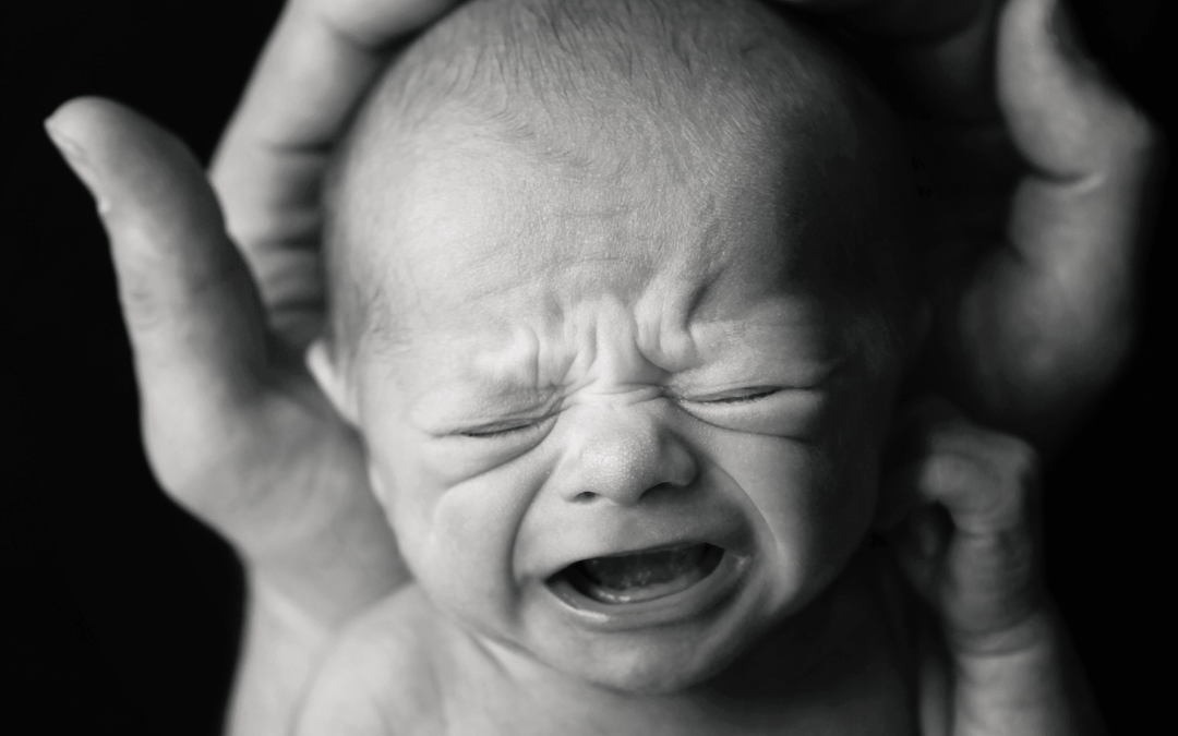 baby crying for article about baby blues from postpartum doula
